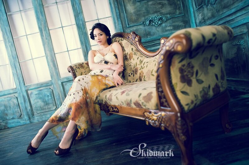 Woman in Floral Dress — Blue, Dramatic, Photograph, Couch, Window