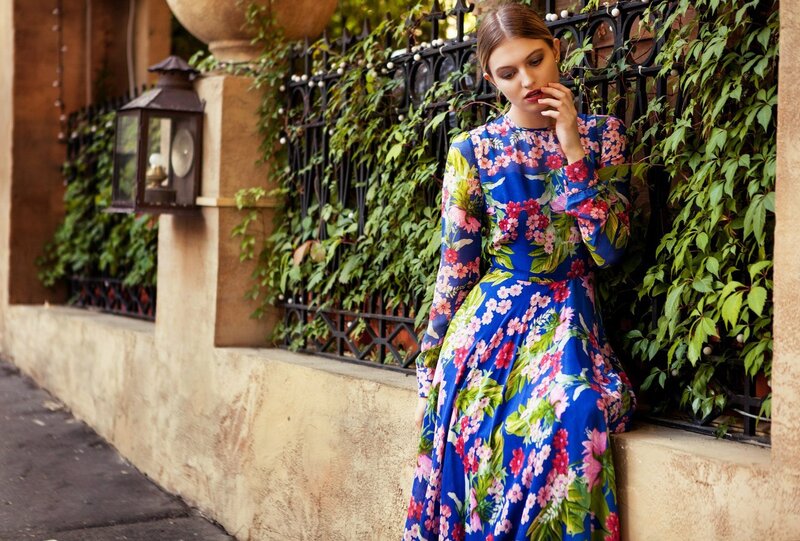 Woman in Floral Dress — Blue, Serene, Afternoon, Photograph, Fence