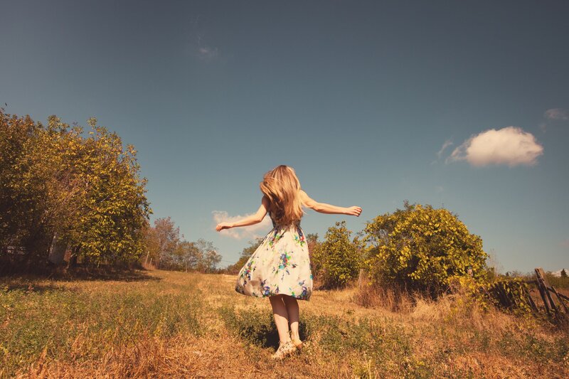 Woman in Floral Dress — Blue, Serene, Afternoon, Photograph, Field