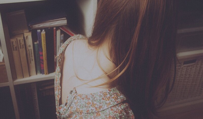 woman in floral dress from behind