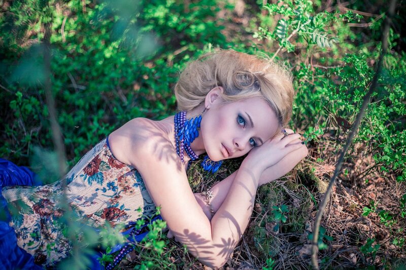 Woman in Floral Dress — Green, Serene, Afternoon, Photograph, Blue Necklace