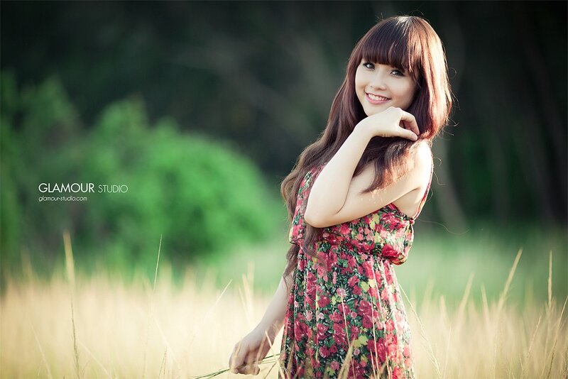 Woman in Floral Dress — Green, Serene, Afternoon, Photograph, Field, Grass, Trees, Red