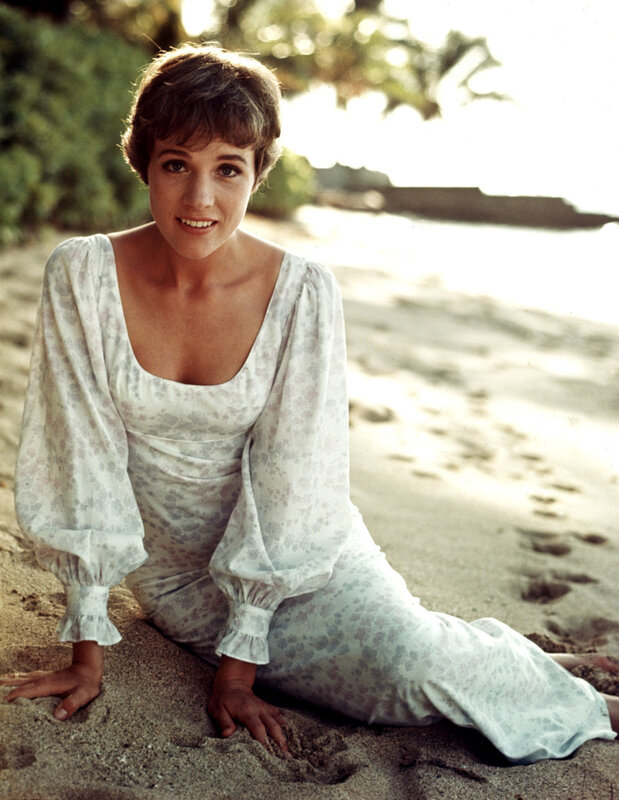 woman in floral dress on beach