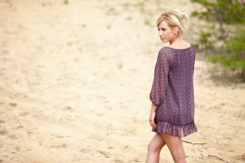 woman in floral dress on beach