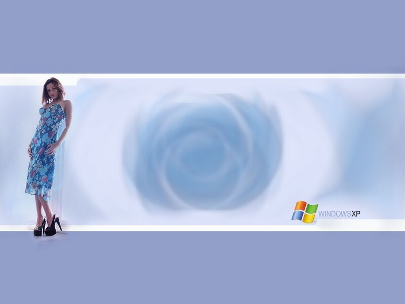 woman in floral dress on blue background