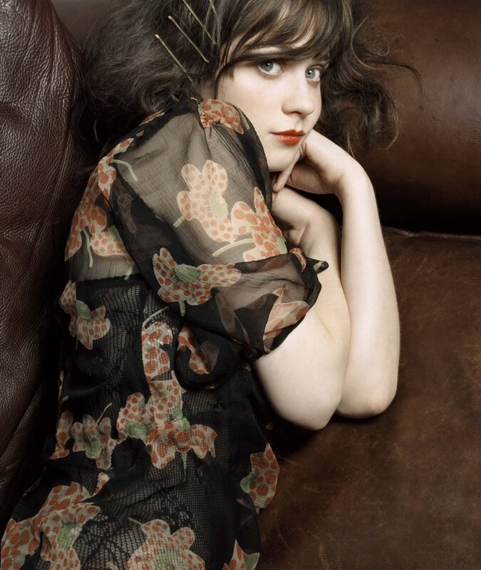 woman in floral dress on couch