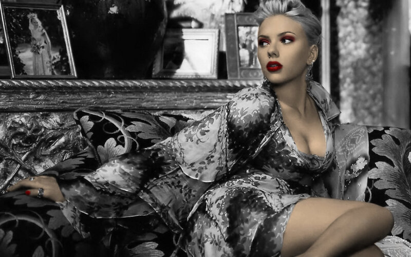 woman in floral dress on couch