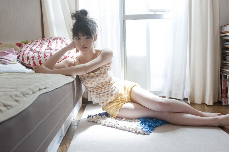 woman in floral dress on floor