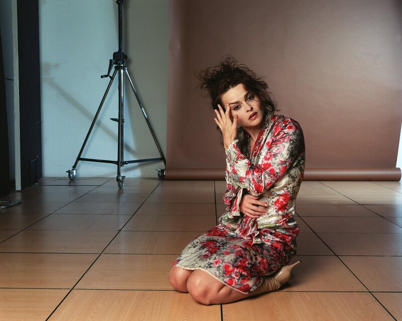 woman in floral dress on floor