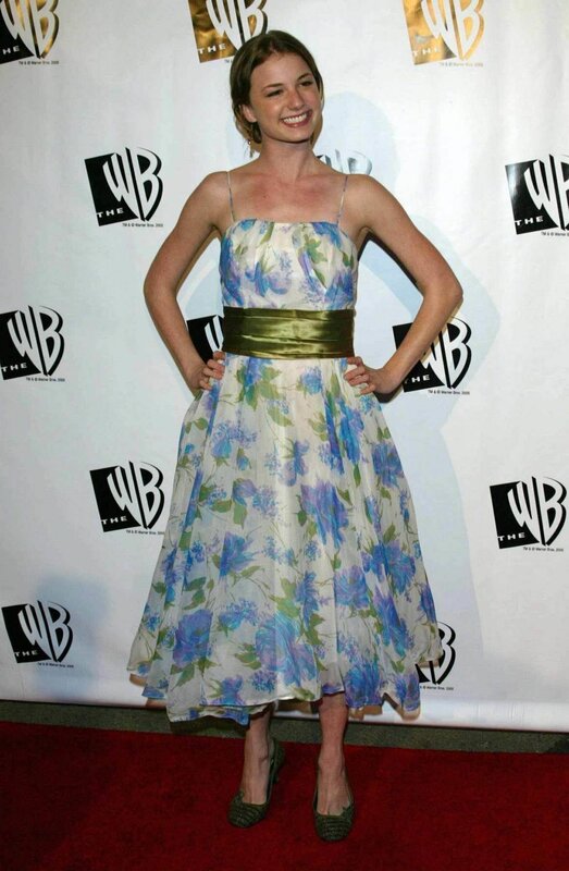 woman in floral dress on red carpet