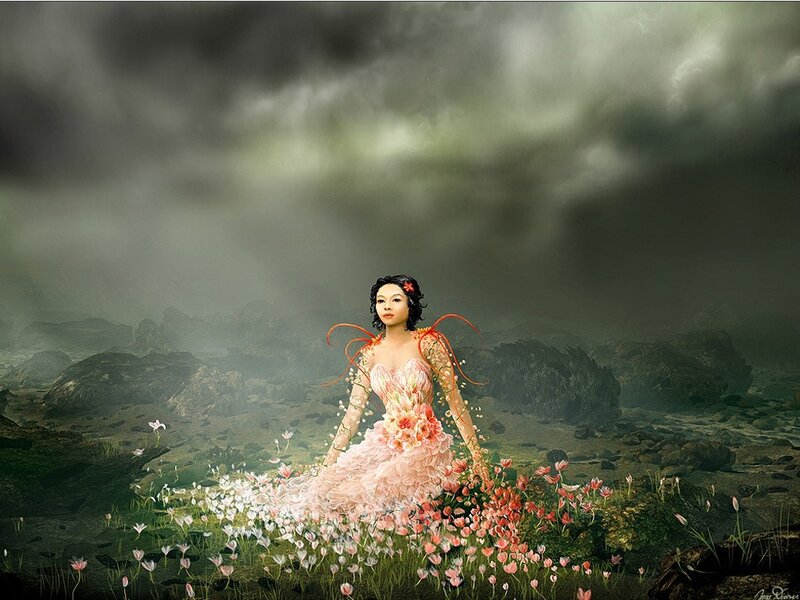 woman in floral dress on rocky field