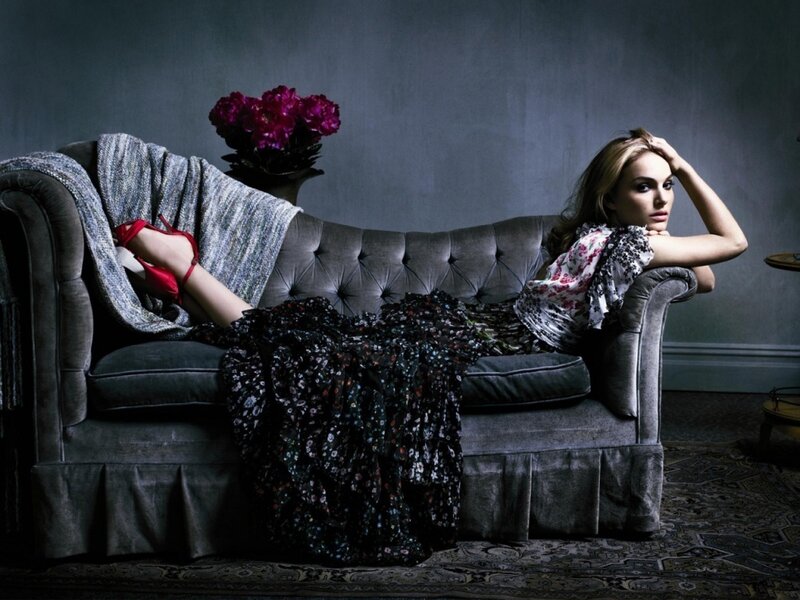 woman in floral dress on sofa