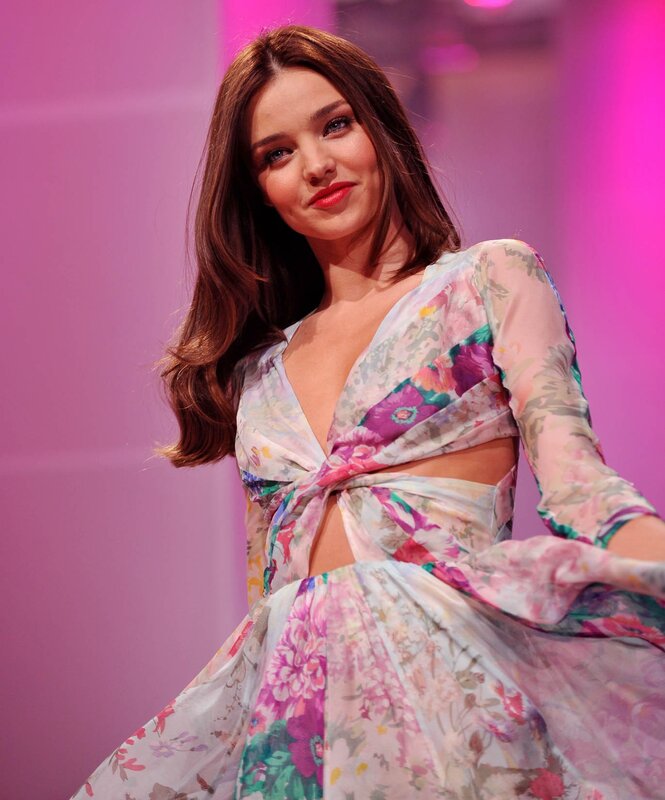 woman in floral dress on stage