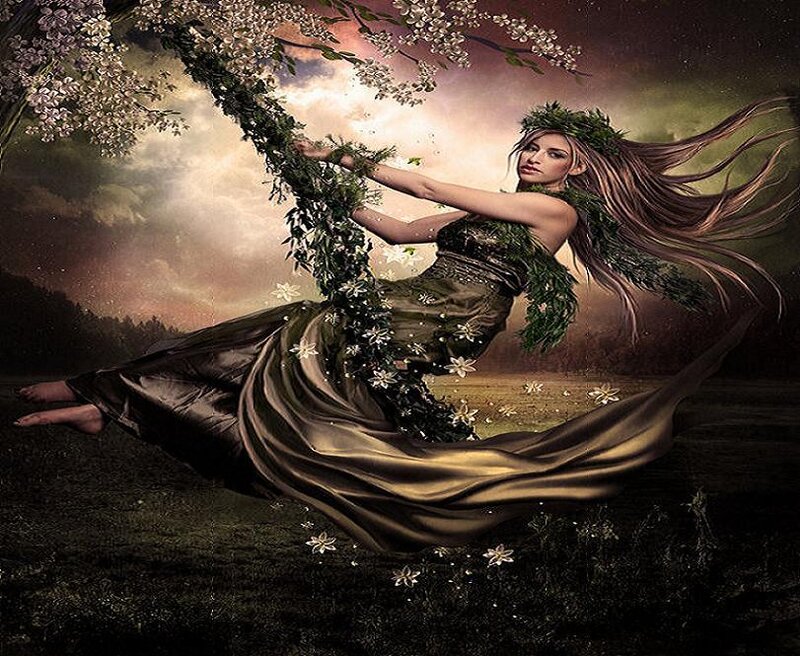 woman in floral dress on swing