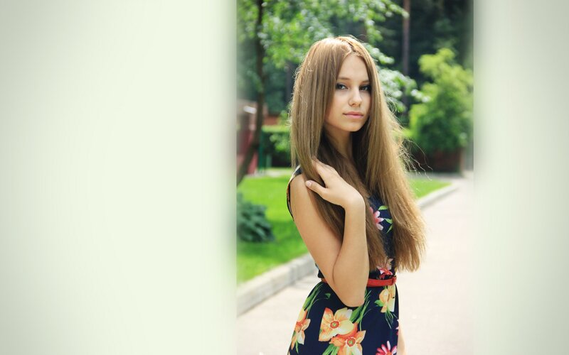 woman in floral dress outdoors