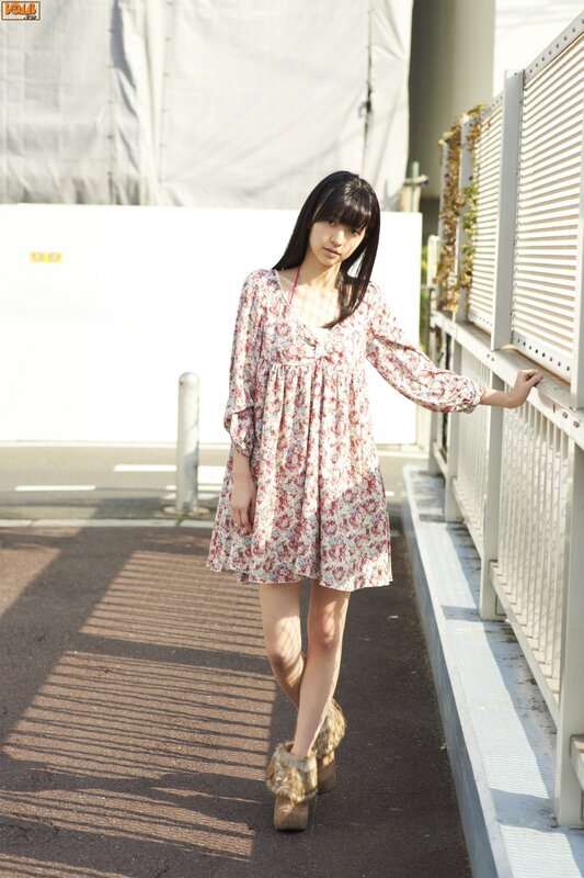 woman in floral dress outdoors