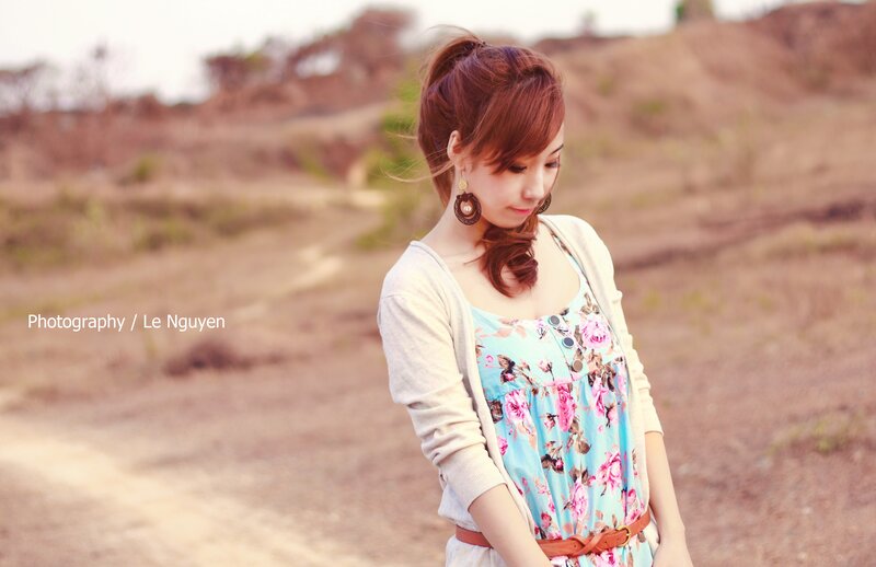 woman in floral dress outdoors
