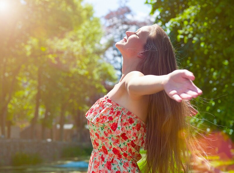woman in floral dress outdoors