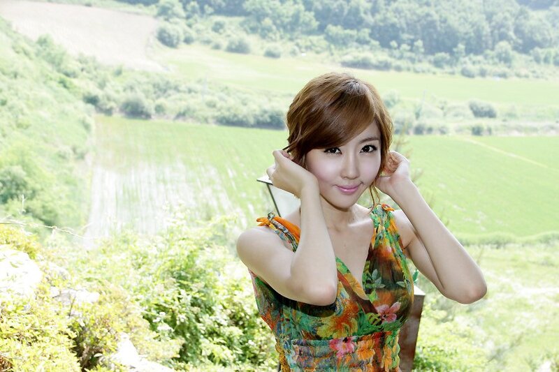 woman in floral dress outdoors