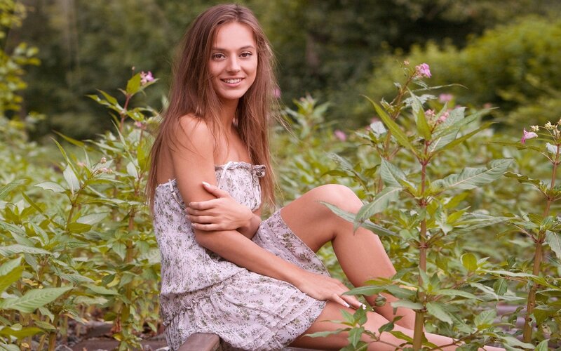 woman in floral dress outdoors