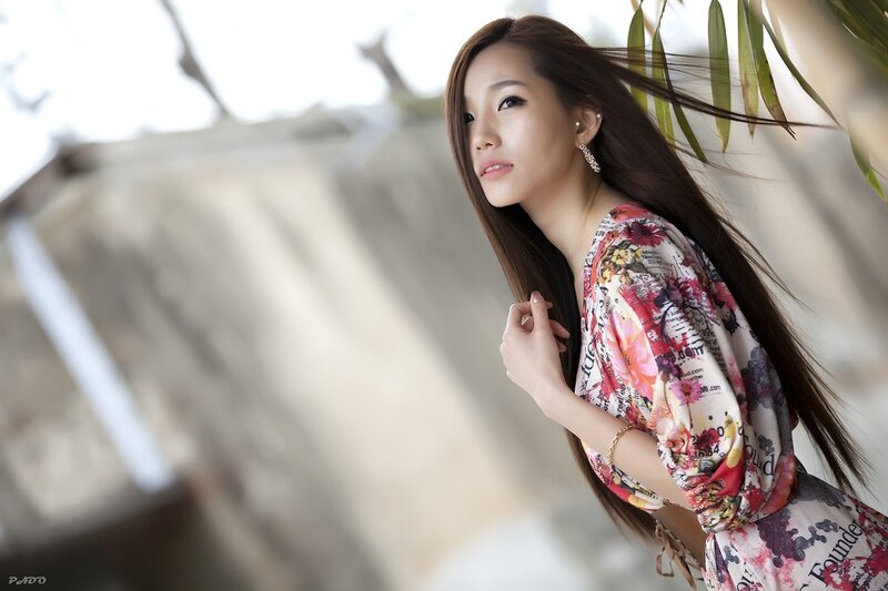 woman in floral dress outdoors