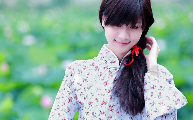 woman in floral dress outdoors