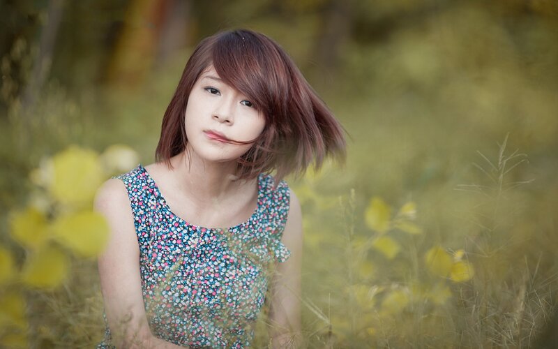 woman in floral dress outdoors