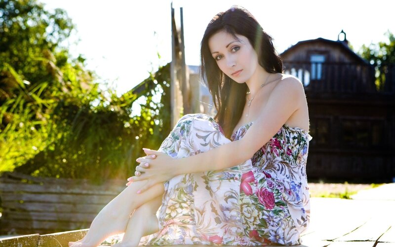 woman in floral dress outdoors