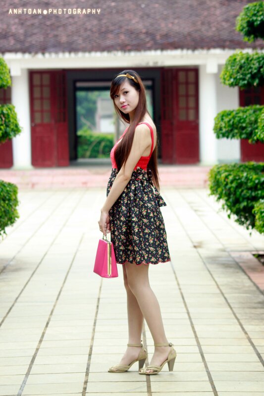 Woman in floral dress outdoors
