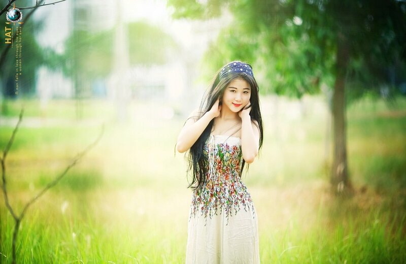 Woman in floral dress outdoors