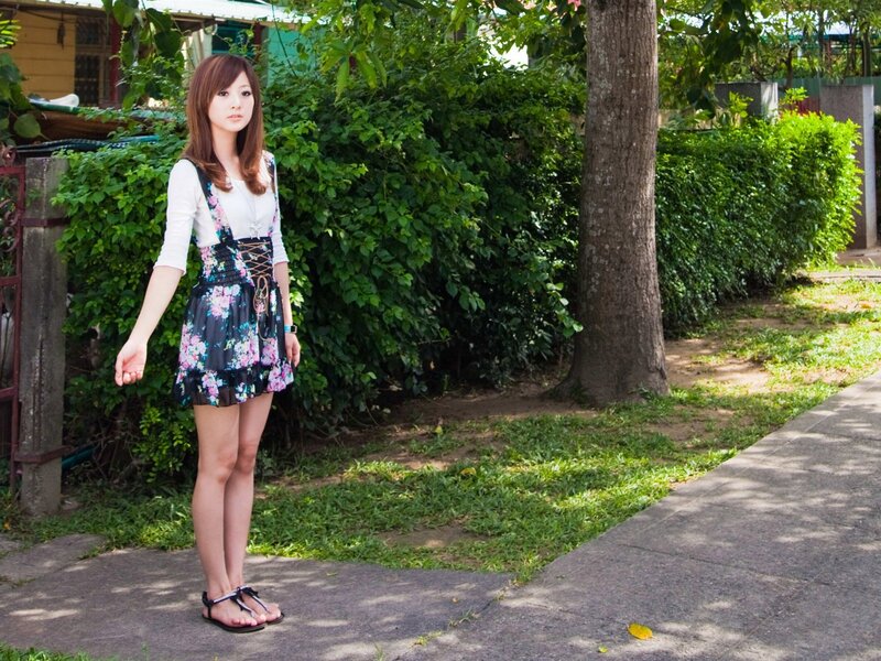 woman in floral dress outdoors