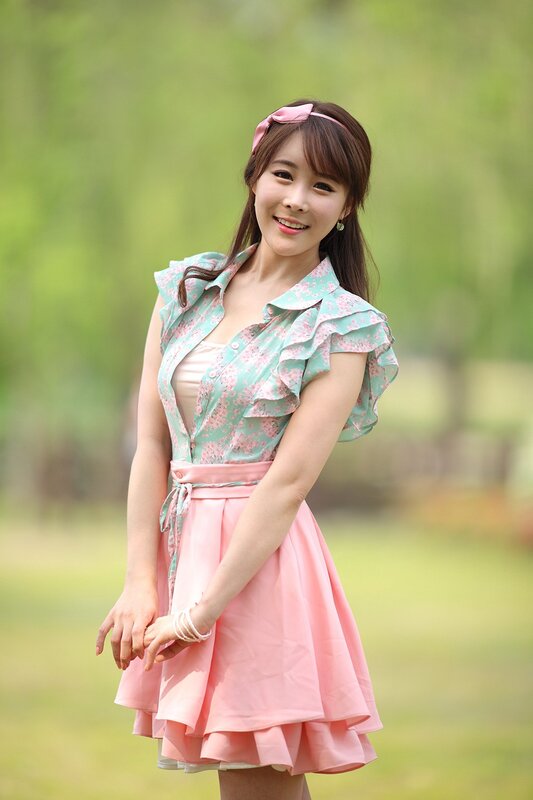 woman in floral dress outdoors