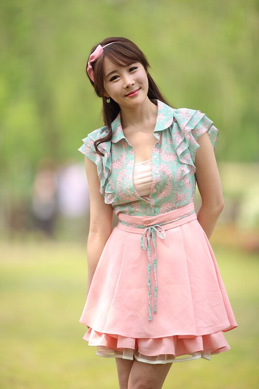 Woman in floral dress outdoors