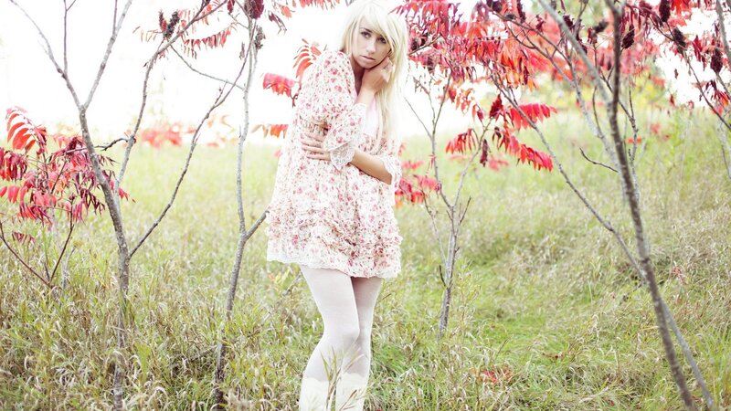 Woman in floral dress outdoors