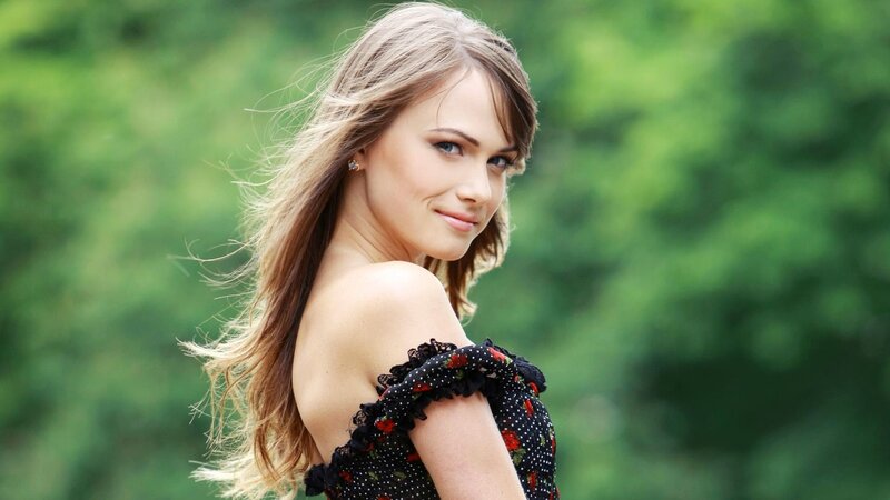 woman in floral dress outdoors