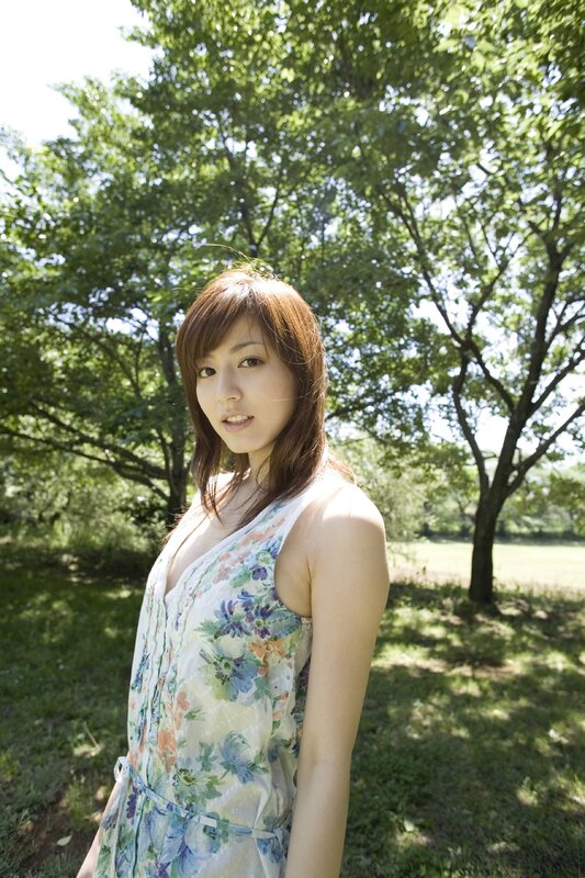 Woman in floral dress outdoors