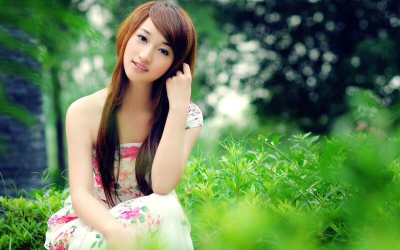 woman in floral dress outdoors