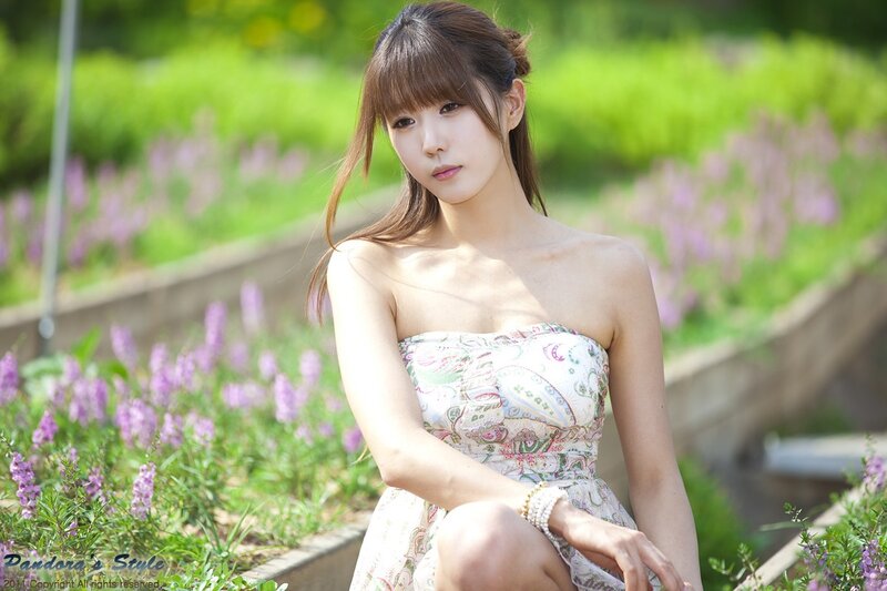 woman in floral dress outdoors