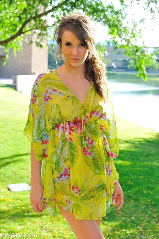 Woman in floral dress outdoors