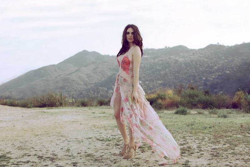 Woman in floral dress outdoors