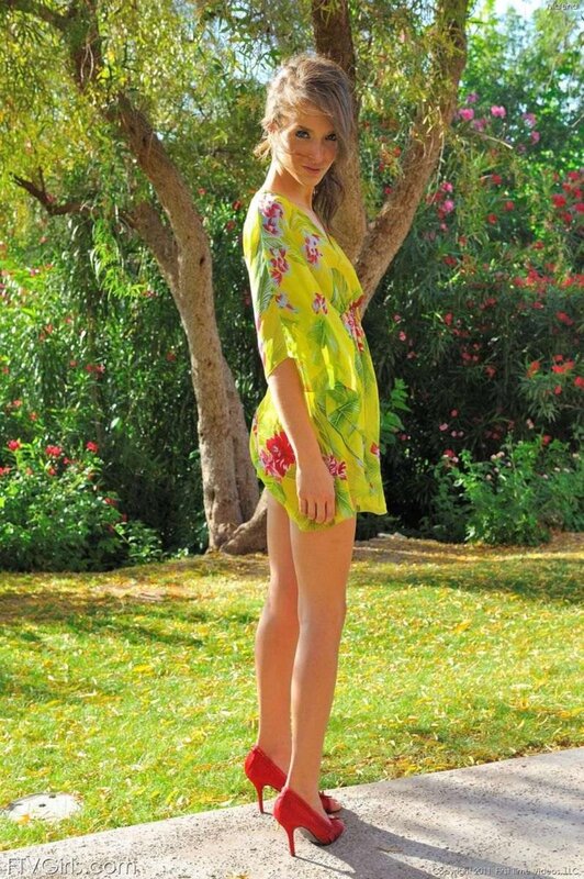 Woman in floral dress outdoors