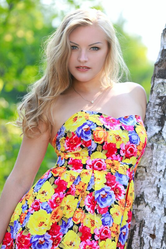 woman in floral dress outdoors