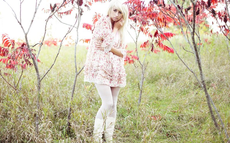 Woman in floral dress outdoors