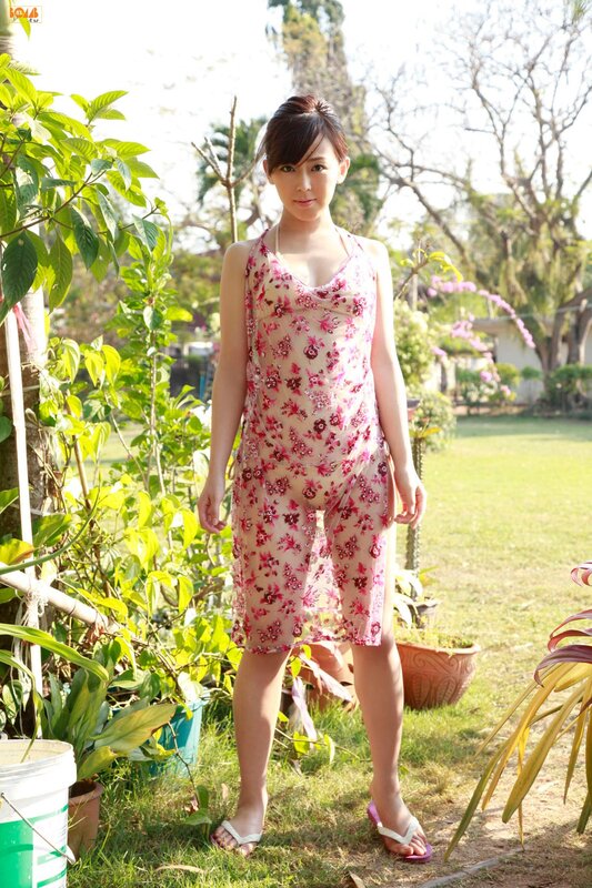 Woman in floral dress outdoors