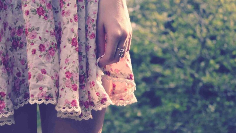 woman in floral dress outdoors