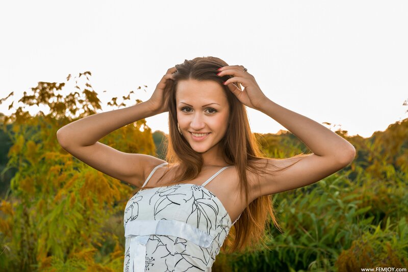 woman in floral dress outdoors