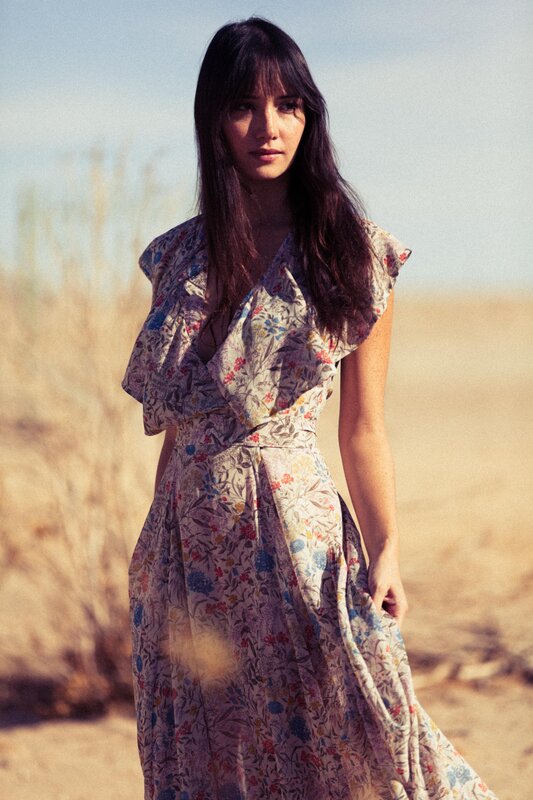 woman in floral dress outdoors
