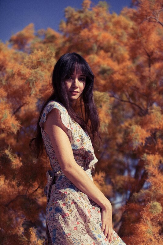 woman in floral dress outdoors