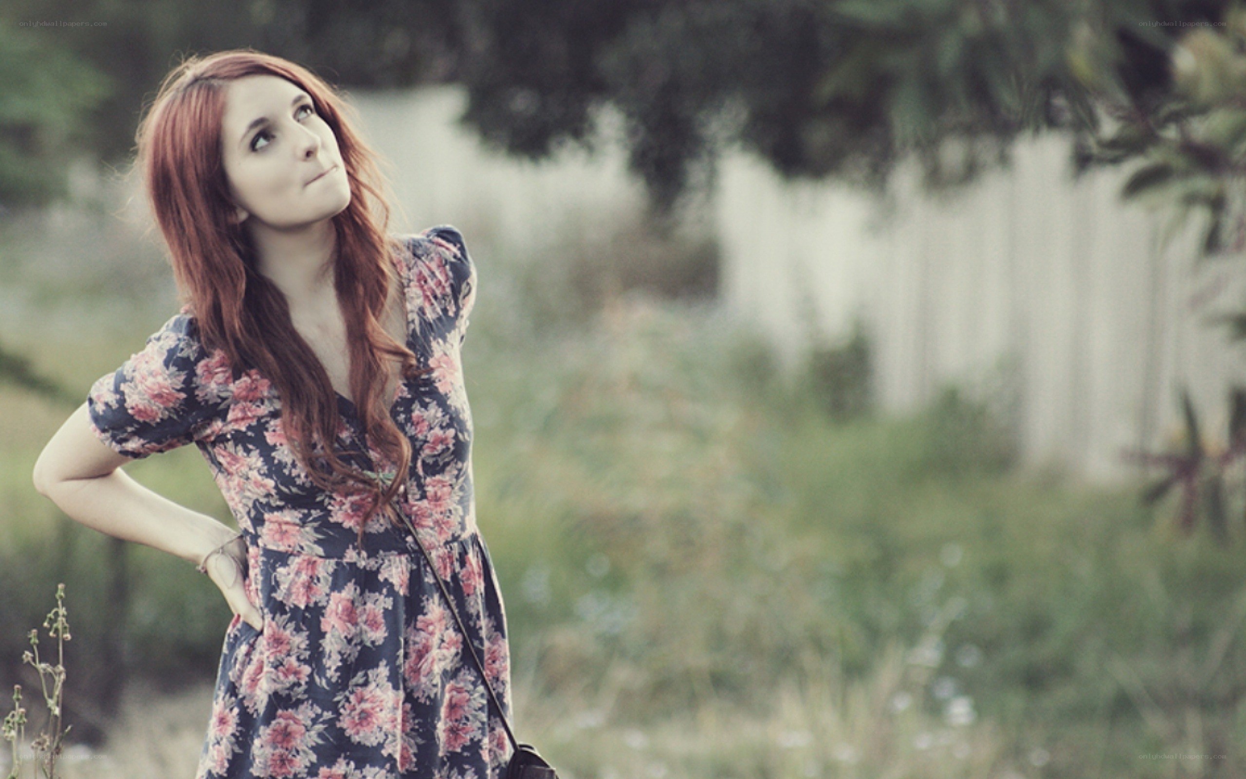 woman in floral dress outdoors