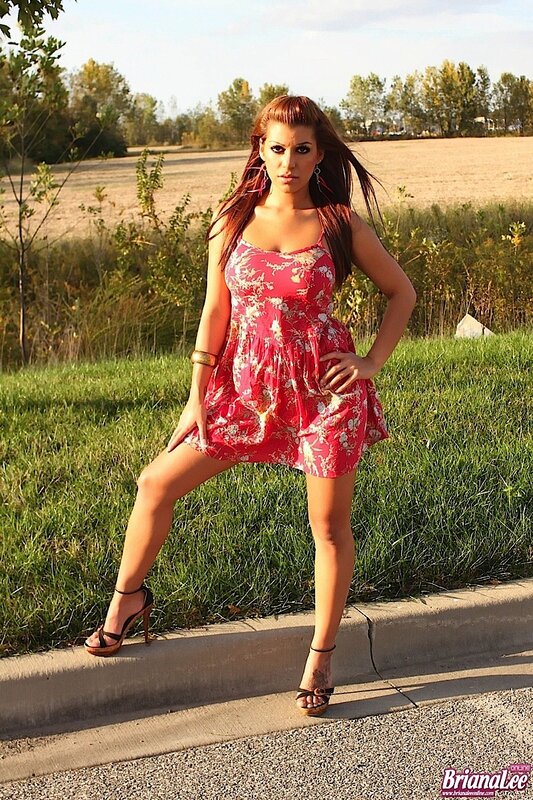 Woman in floral dress outdoors